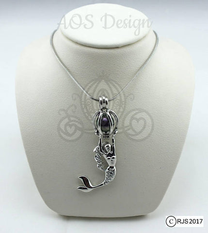Sterling Silver Mermaid Pendant on a Crystal and Pearl Necklace